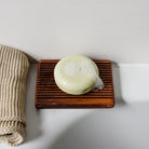 KIND2 The Sensitive One Shampoo Bar on wood tray