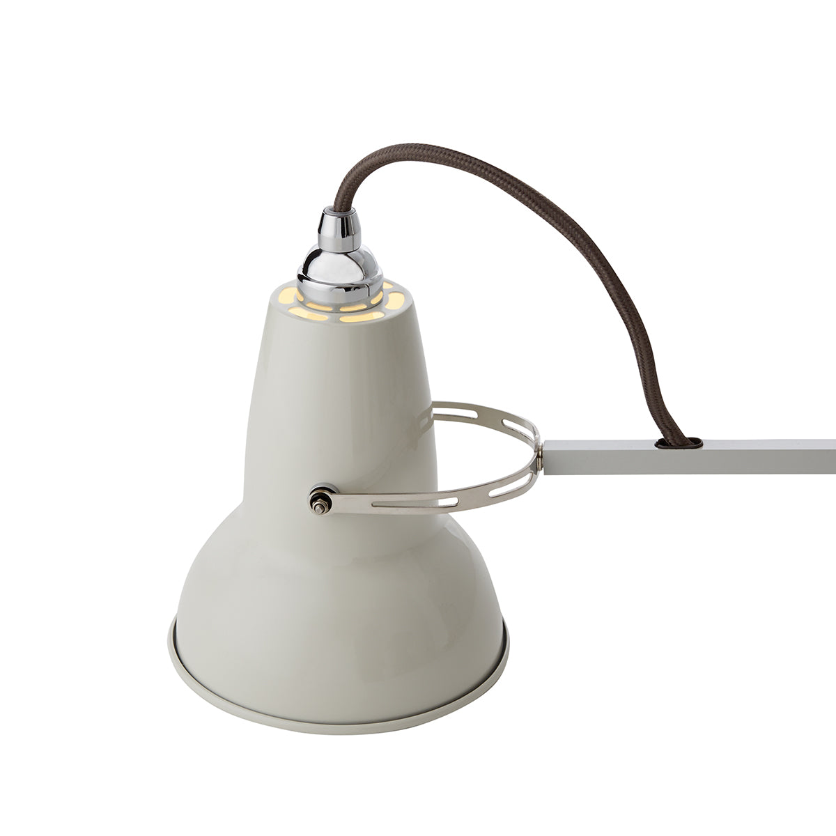 Close-up of illuminated Linen White Anglepoise Original 1227™ Mini Desk Lamp showcasing top quality and elegant design.