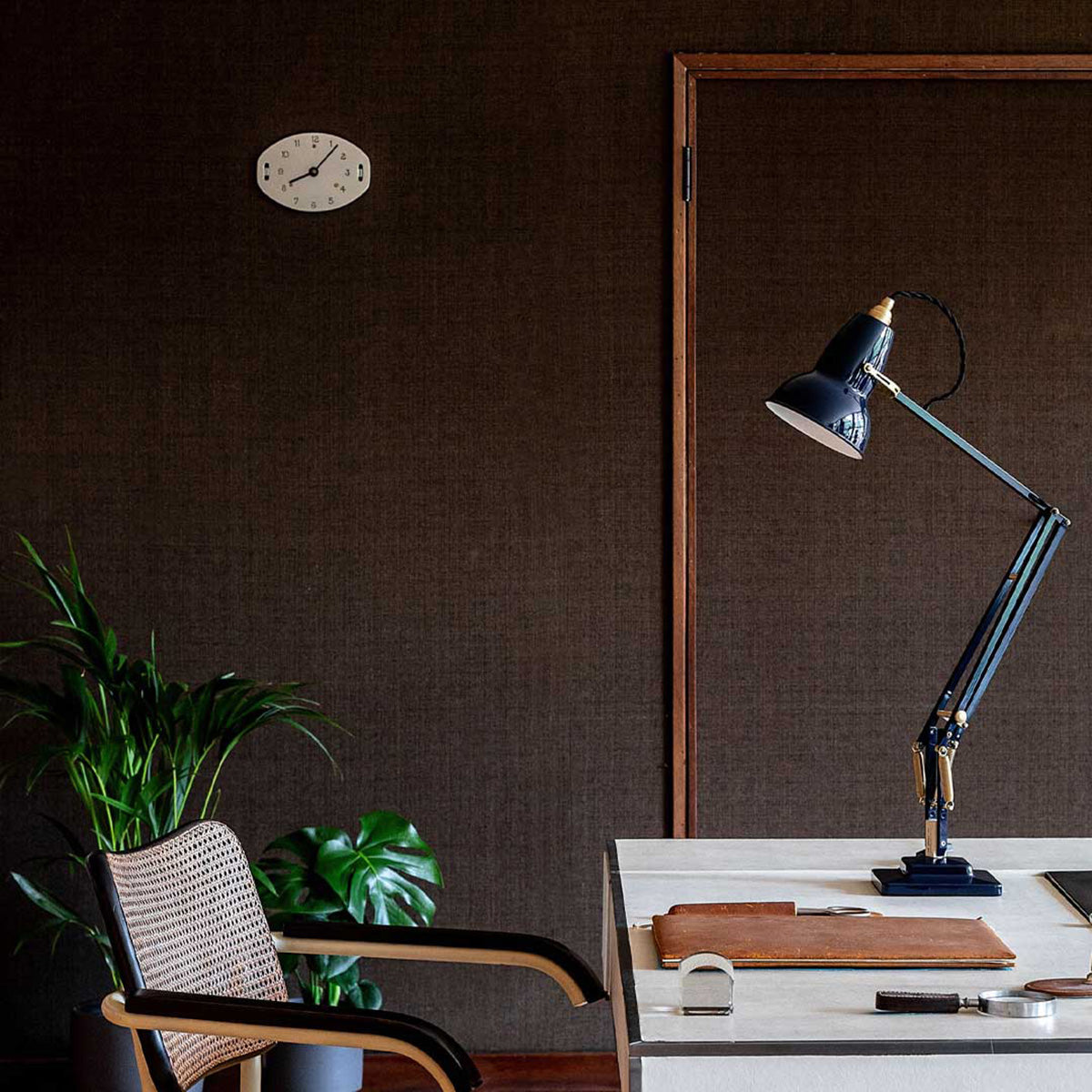 High-quality Ink Blue Anglepoise Original 1227™ Brass Desk Lamp. Stylish, durable, and perfect for focused lighting in any office.