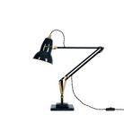 Elegant Ink Blue Anglepoise Original 1227™ Brass Desk Lamp on white table. Premium quality, perfect for stylish workspaces.