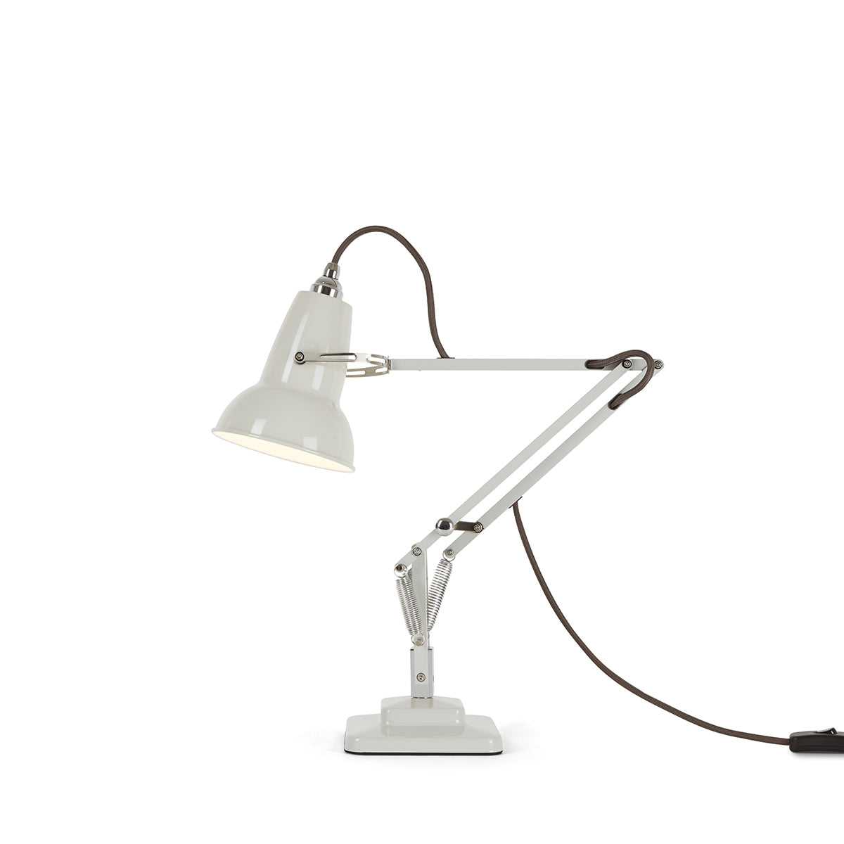 Close-up of Linen White Anglepoise Original 1227™ Mini Desk Lamp. Durable metal build, adjustable shade and joints. Perfect for any workspace.