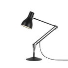 High-quality Jet Black Anglepoise Type 75 Desk Lamp. Sleek design with a black metal body, shade, and base for optimal office lighting.