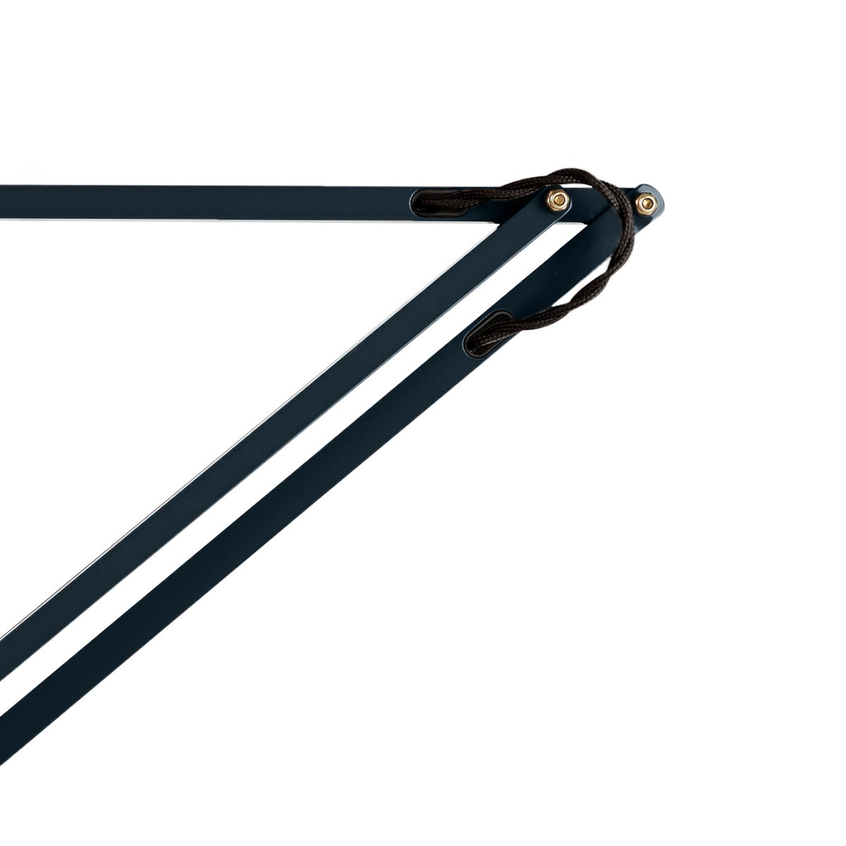 Close-up of high-quality dark blue Anglepoise Original 1227™ Brass Desk Lamp joints with durable brown cords.