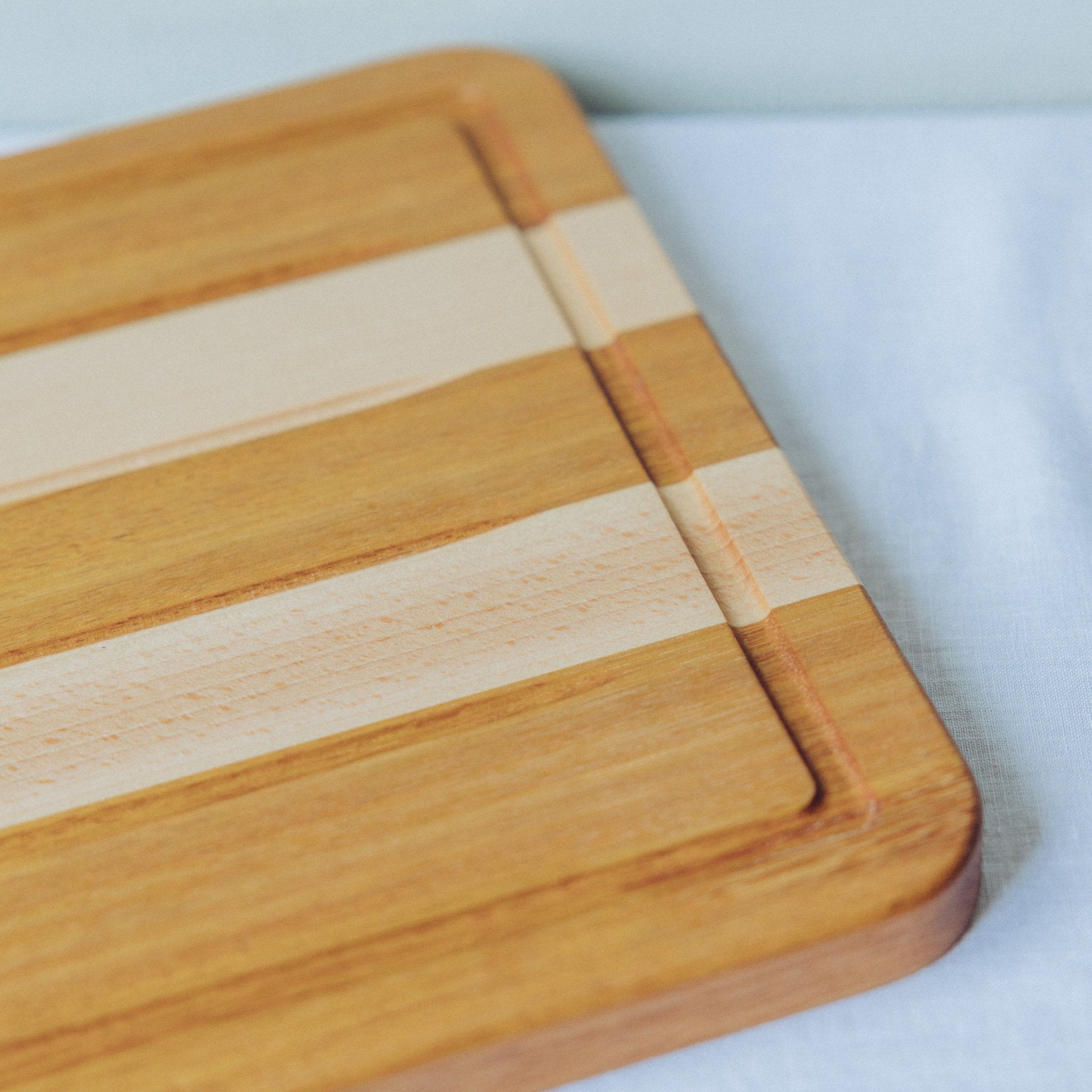 GT Woodshop - Iroko and Beech Carving Board - Buy Me Once UK